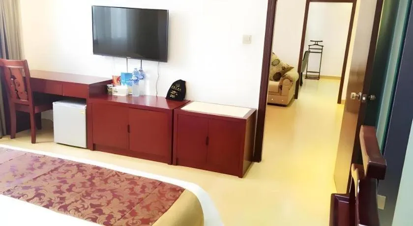 Bed in Jian Guo Grand Hotel