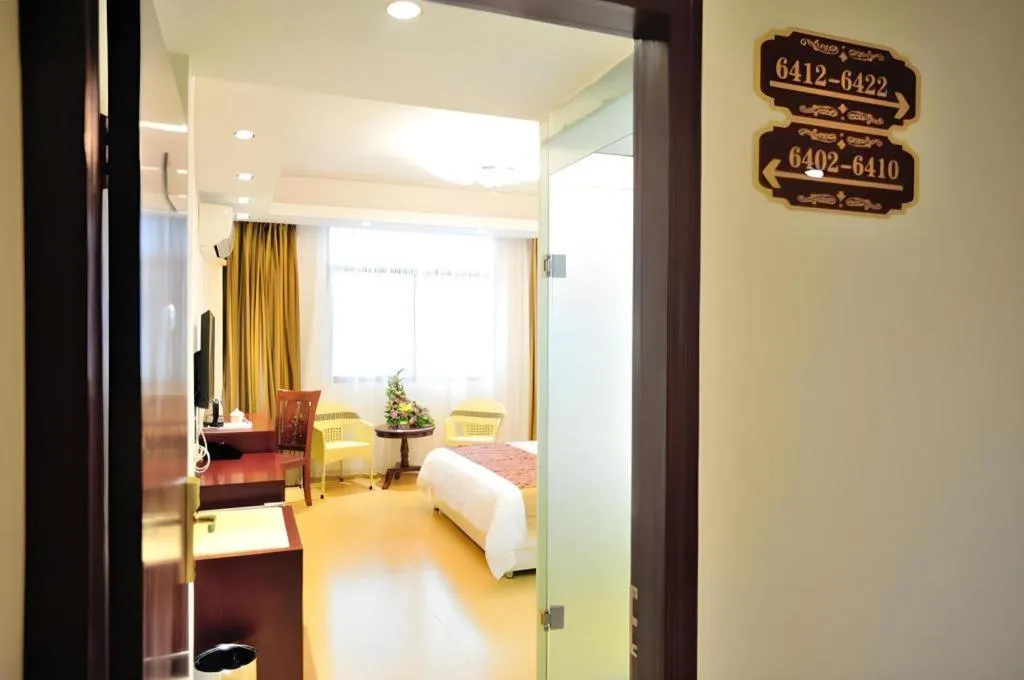 Bed in Jian Guo Grand Hotel