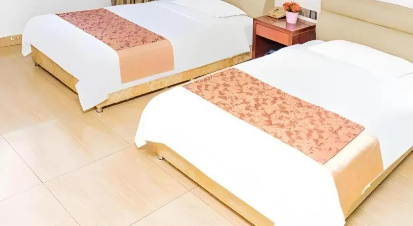 Bed in Jian Guo Grand Hotel