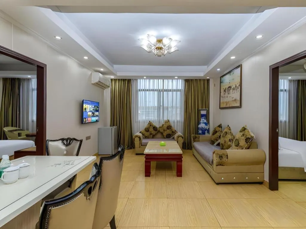 Bed in Jian Guo Grand Hotel