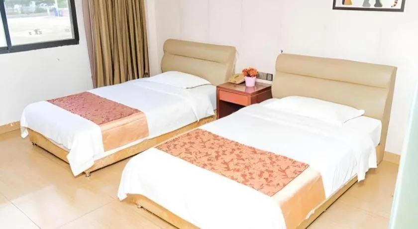 Bed in Jian Guo Grand Hotel