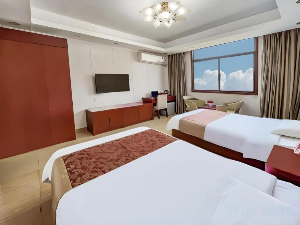 Bed in Jian Guo Grand Hotel