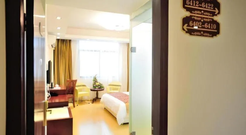 Bed in Jian Guo Grand Hotel