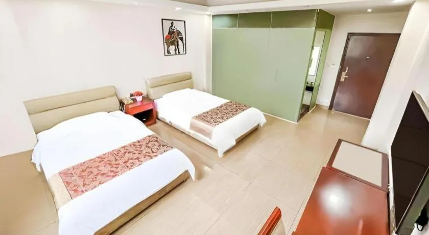 Bed in Jian Guo Grand Hotel