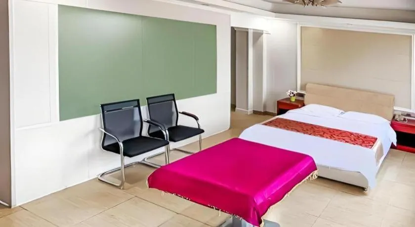 Bed in Jian Guo Grand Hotel