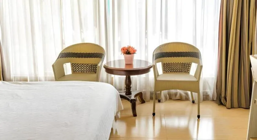 Bed in Jian Guo Grand Hotel