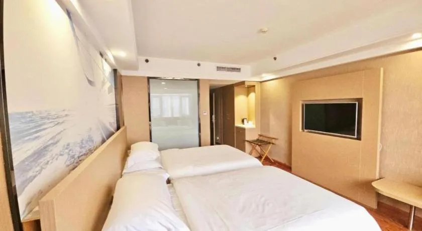 Bed in Vienna Classic Hotel Guilin Quanzhou Central Square