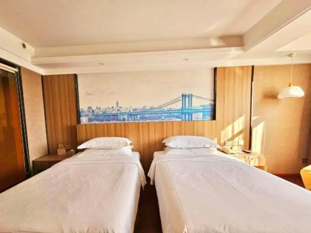 Bed in Vienna Classic Hotel Guilin Quanzhou Central Square