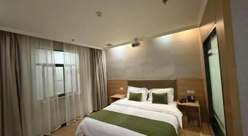 Bed in GreenTree Inn Jiangsu Suzhou Kunshan Beimen Road Express Hotel