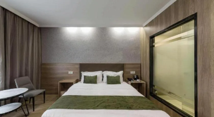 Bed in GreenTree Inn Jiangsu Suzhou Kunshan Beimen Road Express Hotel