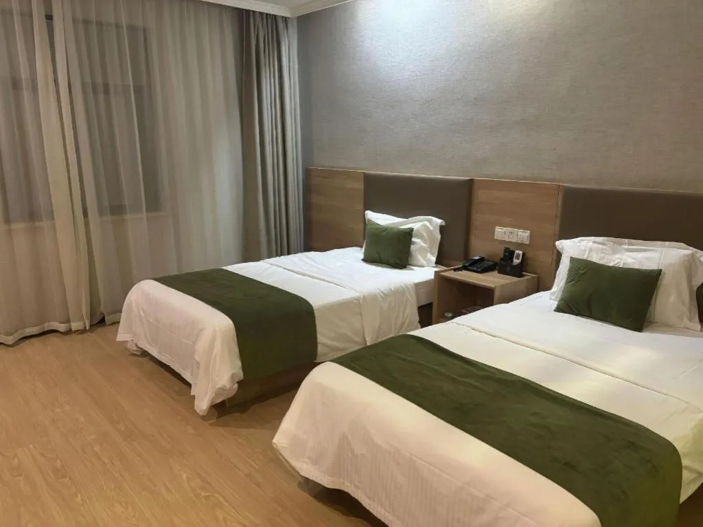Bed in GreenTree Inn Jiangsu Suzhou Kunshan Beimen Road Express Hotel