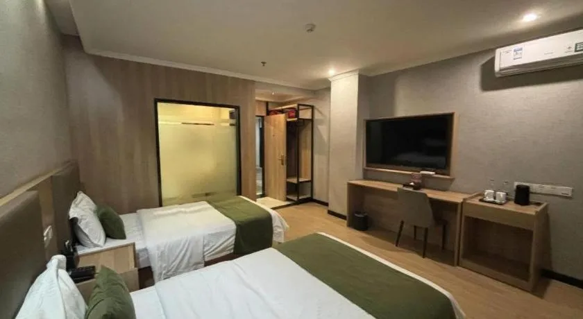 Bed in GreenTree Inn Jiangsu Suzhou Kunshan Beimen Road Express Hotel