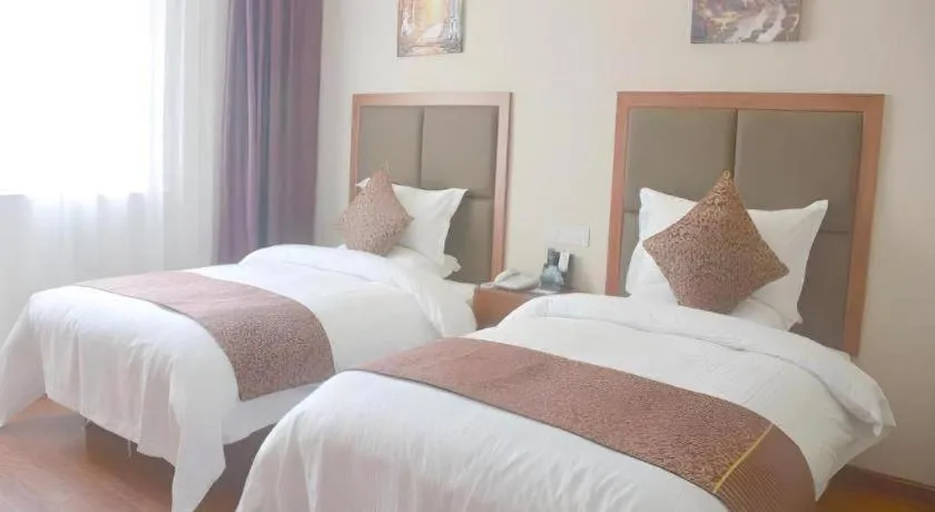 Bed in GreenTree Inn Jiangsu Suzhou Kunshan Beimen Road Express Hotel