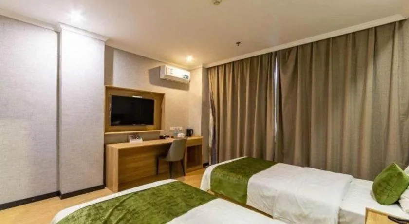 Bed in GreenTree Inn Jiangsu Suzhou Kunshan Beimen Road Express Hotel