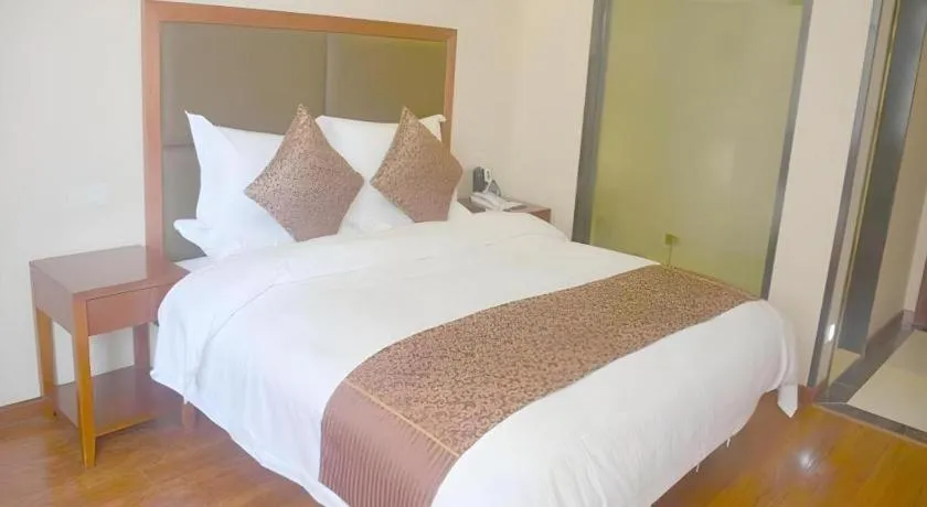 Bed in GreenTree Inn Jiangsu Suzhou Kunshan Beimen Road Express Hotel