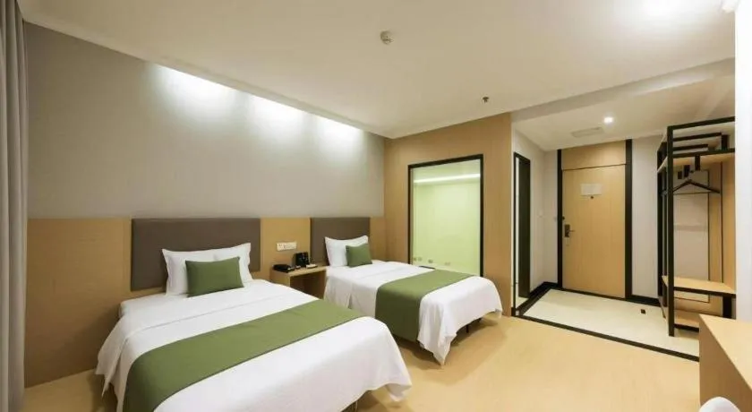 Bed in GreenTree Inn Jiangsu Suzhou Kunshan Beimen Road Express Hotel