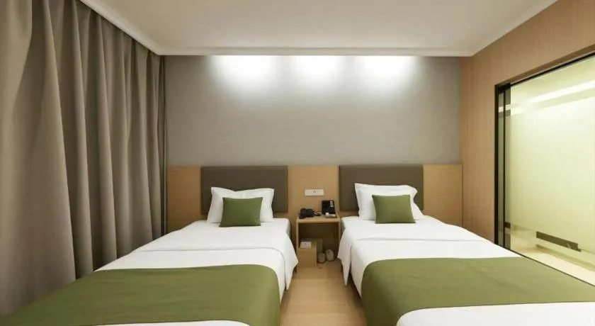 Bed in GreenTree Inn Jiangsu Suzhou Kunshan Beimen Road Express Hotel