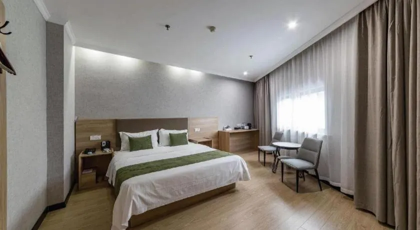Bed in GreenTree Inn Jiangsu Suzhou Kunshan Beimen Road Express Hotel