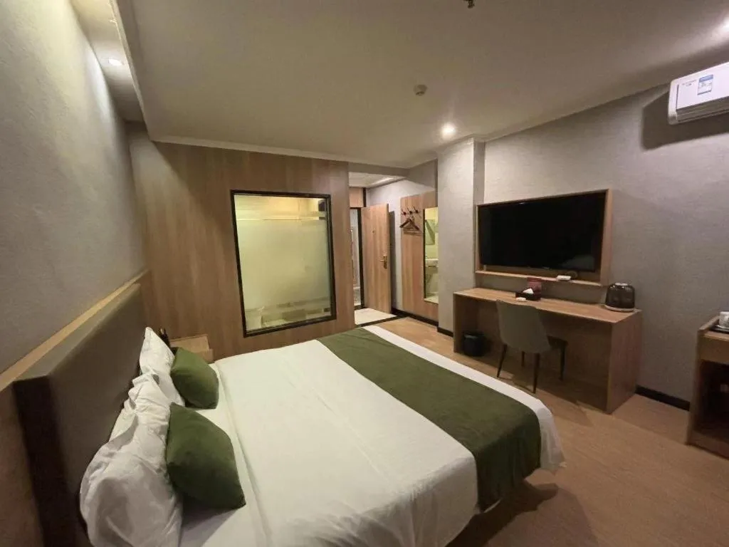 Bed in GreenTree Inn Jiangsu Suzhou Kunshan Beimen Road Express Hotel