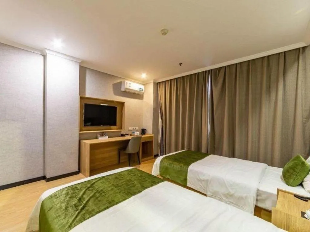 Bed in GreenTree Inn Jiangsu Suzhou Kunshan Beimen Road Express Hotel
