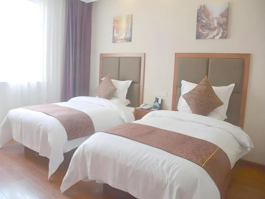 Bed in GreenTree Inn Jiangsu Suzhou Kunshan Beimen Road Express Hotel