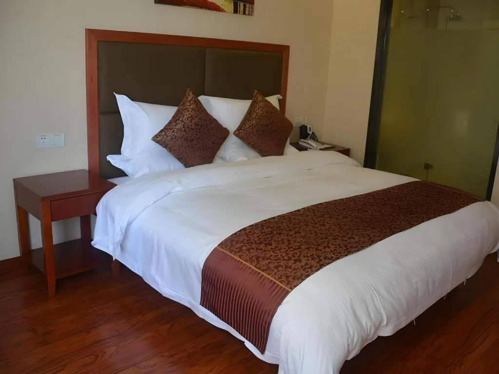 Bed in GreenTree Inn Jiangsu Suzhou Kunshan Beimen Road Express Hotel