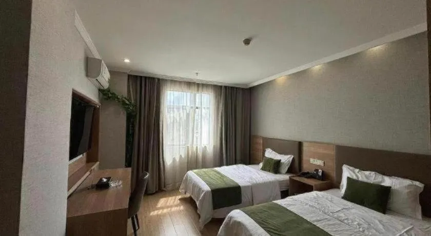 Bed in GreenTree Inn Jiangsu Suzhou Kunshan Beimen Road Express Hotel