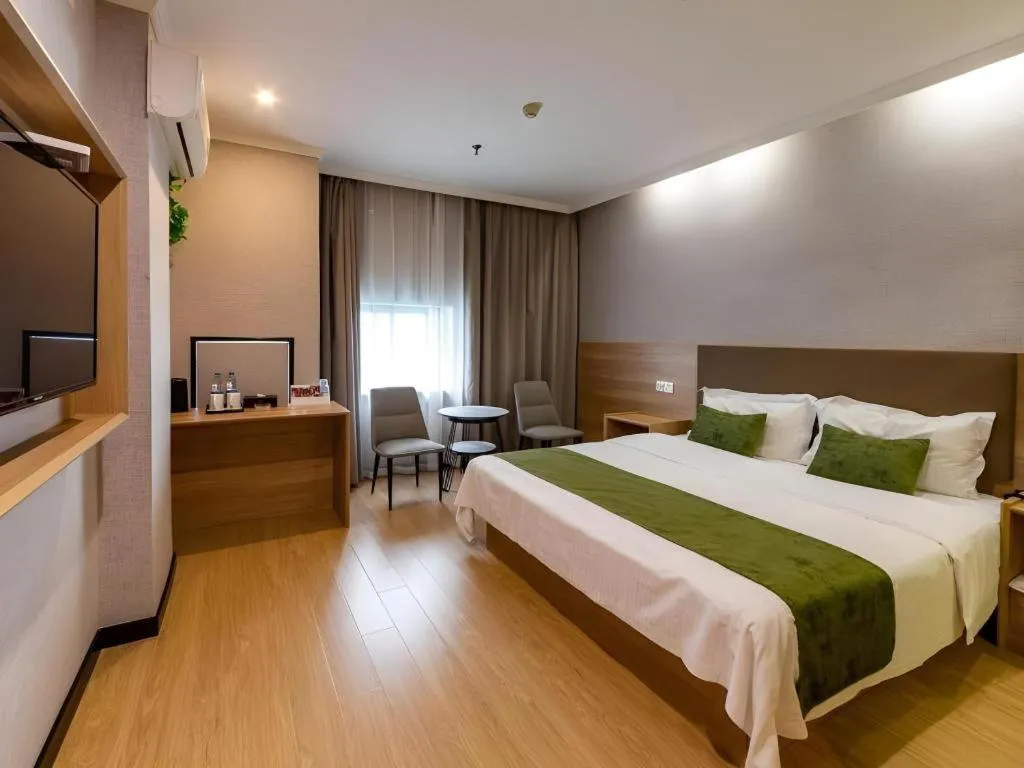 Bed in GreenTree Inn Jiangsu Suzhou Kunshan Beimen Road Express Hotel