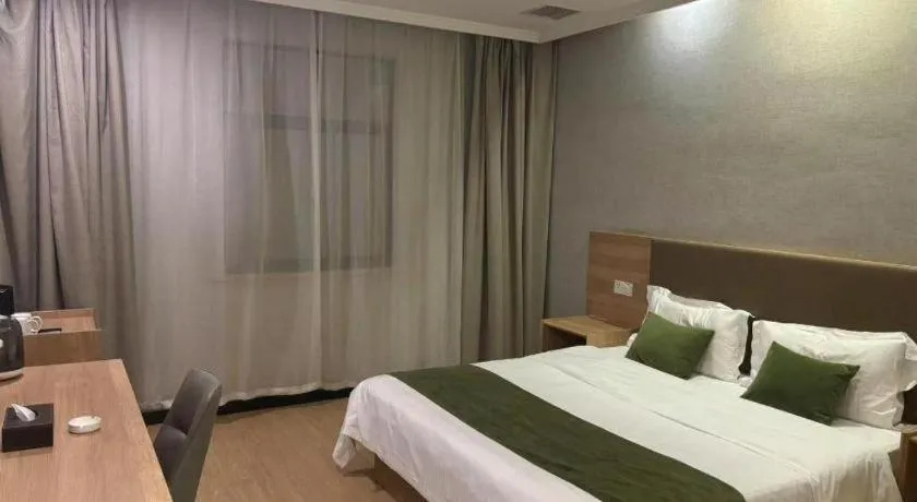 Bed in GreenTree Inn Jiangsu Suzhou Kunshan Beimen Road Express Hotel