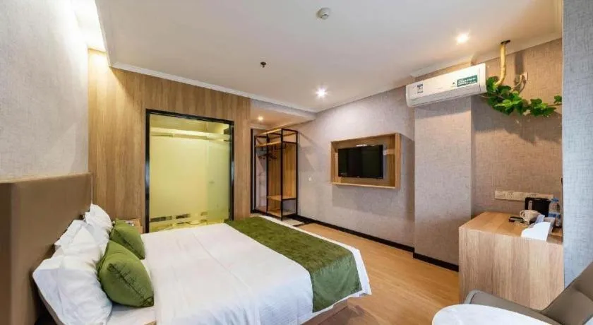 Bed in GreenTree Inn Jiangsu Suzhou Kunshan Beimen Road Express Hotel