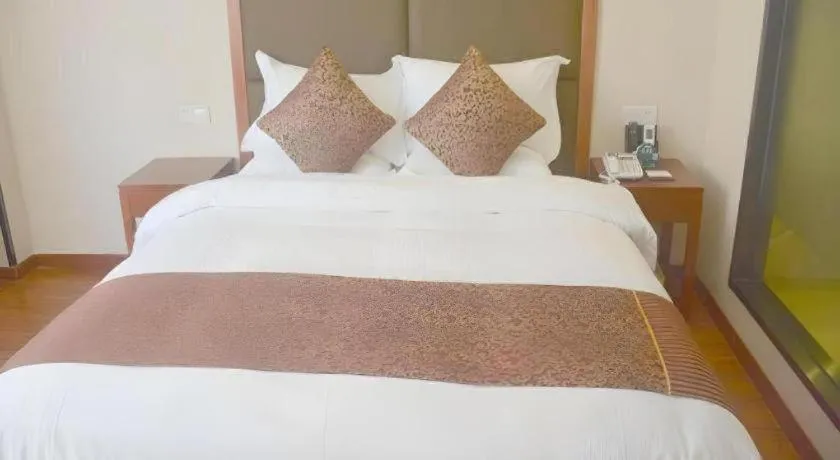 Bed in GreenTree Inn Jiangsu Suzhou Kunshan Beimen Road Express Hotel