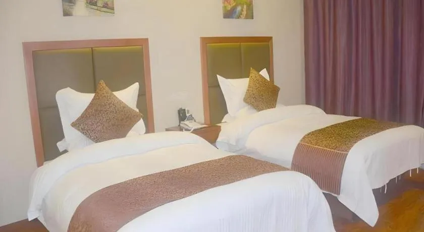 Bed in GreenTree Inn Jiangsu Suzhou Kunshan Beimen Road Express Hotel