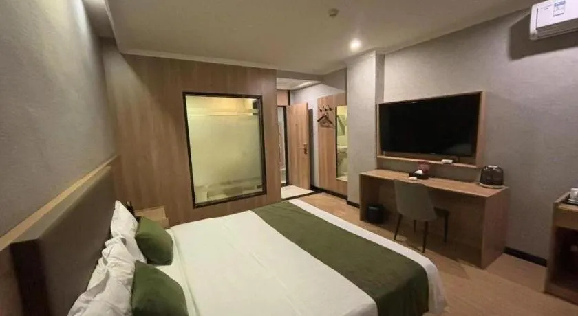 Bed in GreenTree Inn Jiangsu Suzhou Kunshan Beimen Road Express Hotel