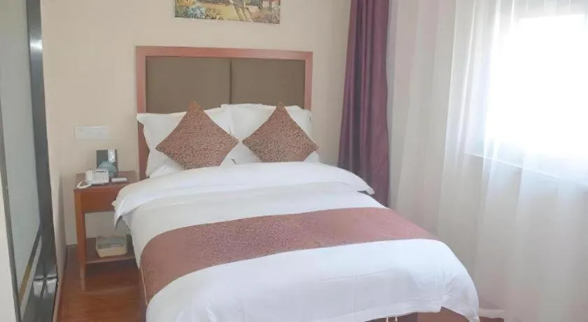 Bed in GreenTree Inn Jiangsu Suzhou Kunshan Beimen Road Express Hotel