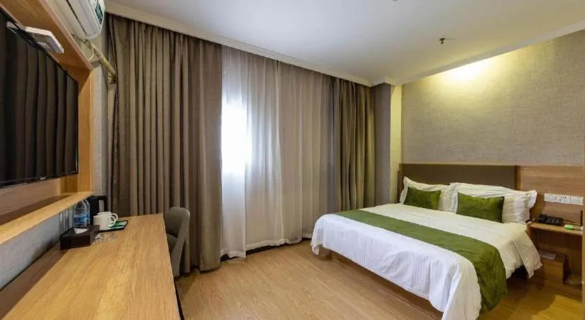 Bed in GreenTree Inn Jiangsu Suzhou Kunshan Beimen Road Express Hotel
