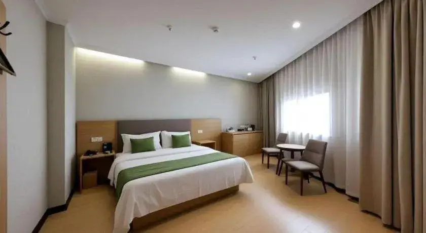 Bed in GreenTree Inn Jiangsu Suzhou Kunshan Beimen Road Express Hotel Bed in GreenTree Inn Jiangsu Suzhou Kunshan Beimen Road Express Hotel