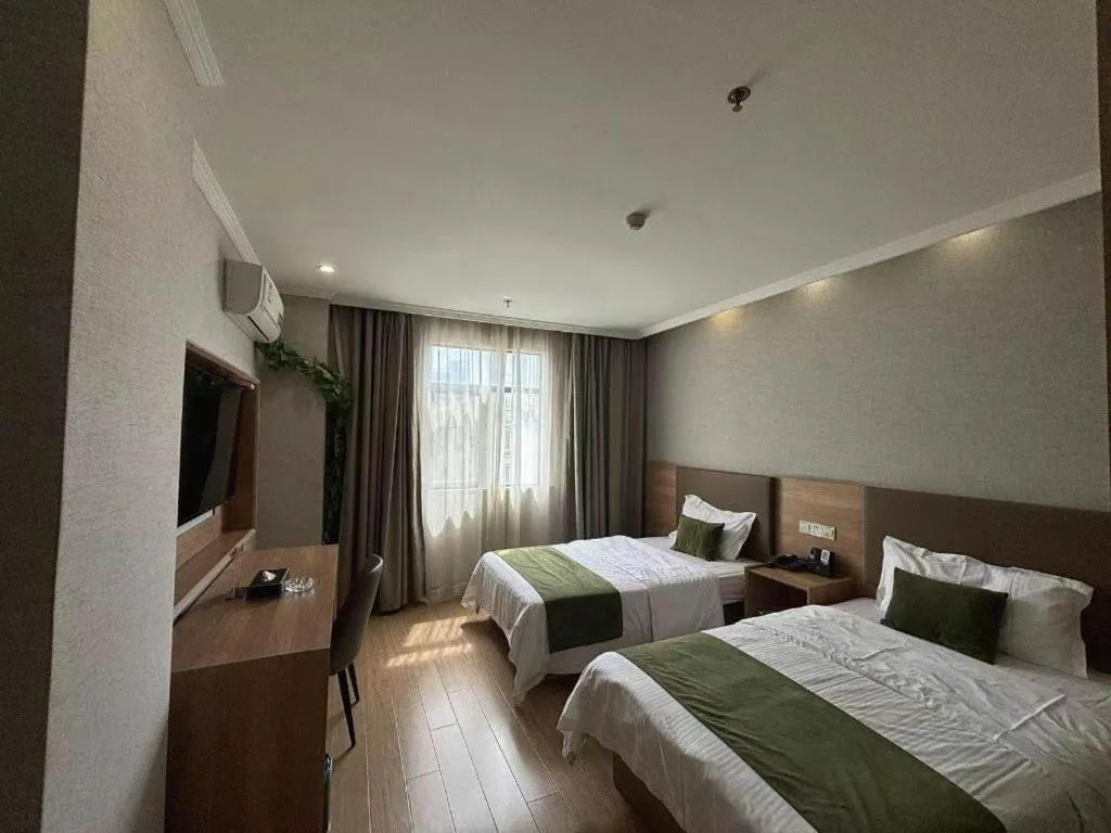 Bed in GreenTree Inn Jiangsu Suzhou Kunshan Beimen Road Express Hotel