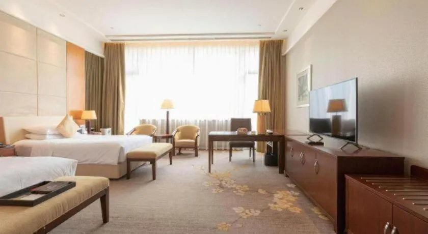 Bed in Suzhou Jinji Lake Grand Hotel