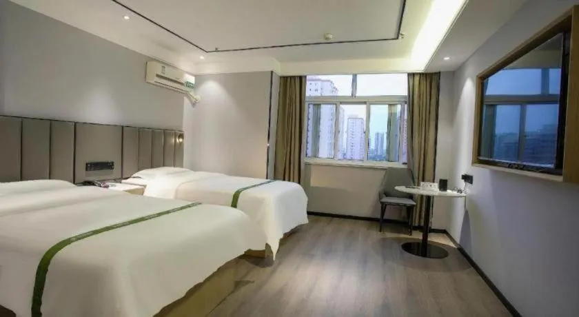 Bed in GreenTree Inn LiaoCheng LinQing HaiShan Building Express Hotel