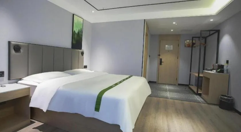 Bed in GreenTree Inn LiaoCheng LinQing HaiShan Building Express Hotel