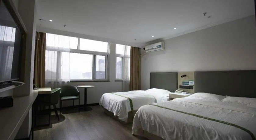 Bed in GreenTree Inn LiaoCheng LinQing HaiShan Building Express Hotel