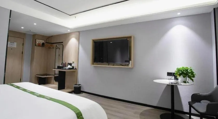 Bed in GreenTree Inn LiaoCheng LinQing HaiShan Building Express Hotel