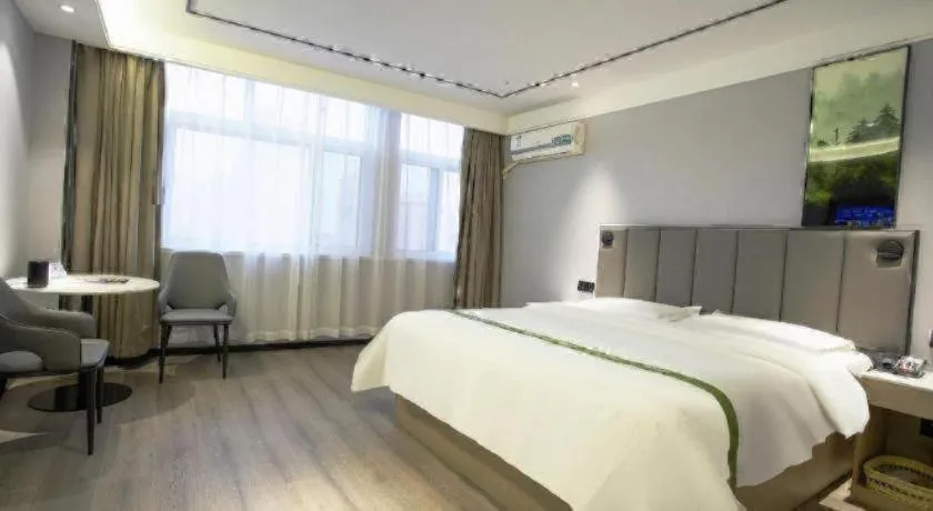 Bed in GreenTree Inn LiaoCheng LinQing HaiShan Building Express Hotel