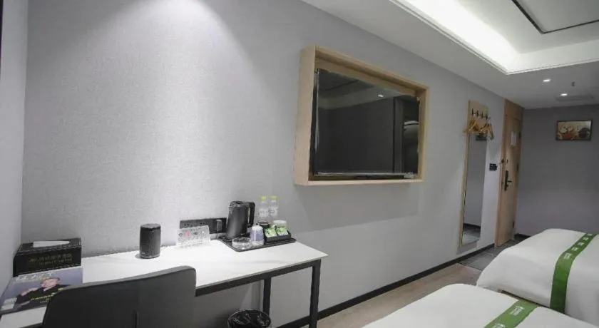 Bed in GreenTree Inn LiaoCheng LinQing HaiShan Building Express Hotel