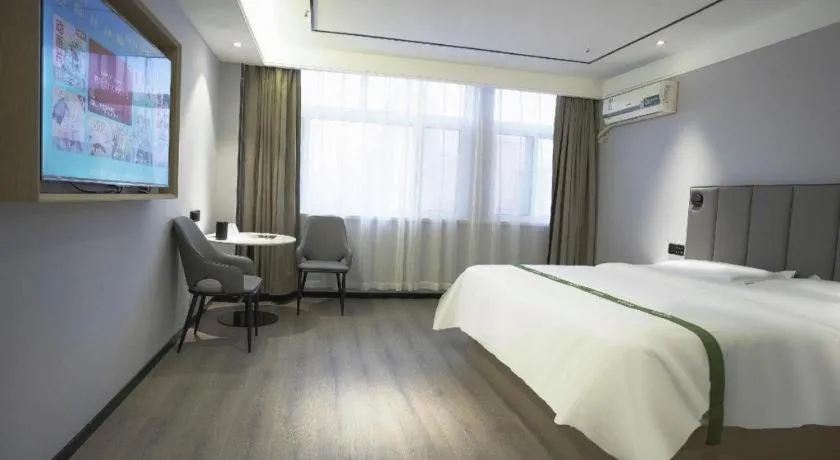 Bed in GreenTree Inn LiaoCheng LinQing HaiShan Building Express Hotel