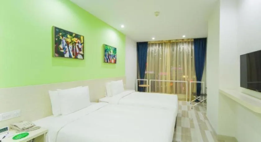 Bed in Gtel Rock City Qingdao Hotel