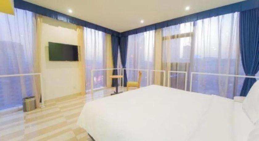 Bed in Gtel Rock City Qingdao Hotel