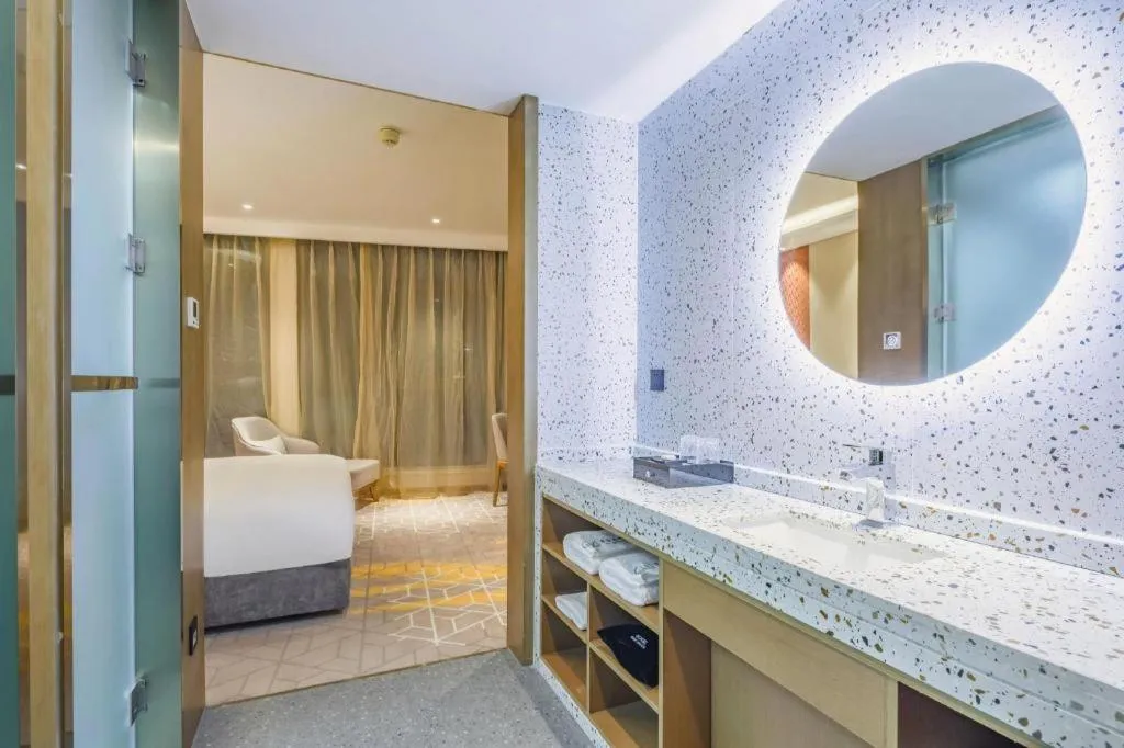 Bed in Gtel Rock City Qingdao Hotel