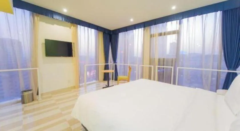 Bed in Gtel Rock City Qingdao Hotel