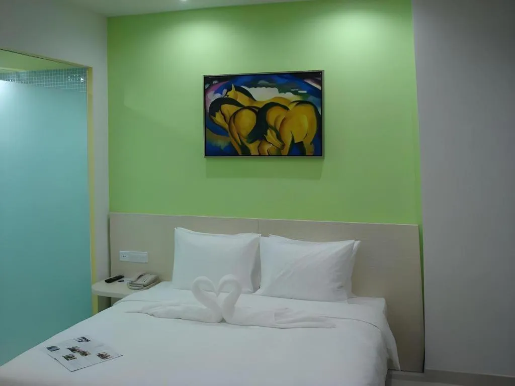 Bed in Gtel Rock City Qingdao Hotel